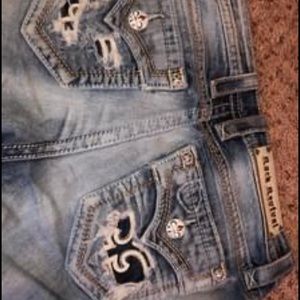 Rock Revival distressed skinny jeans